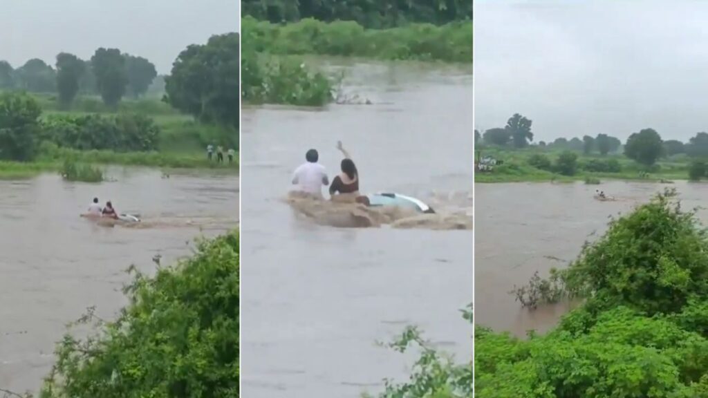 Couple Rescued After Being Stranded on Car Roof