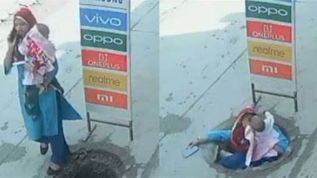 Woman falls into open manhole